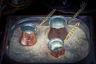 Turkish coffee pots made of metal in a traditional style