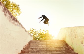 Man doing parkour jumping walls. Latin man doing parkour jumping walls