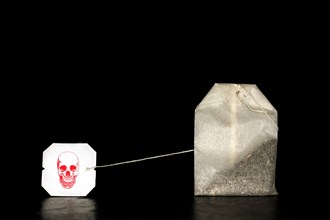 Symbol photo for tea bag contaminated with pesticides