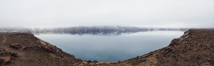 Thick fog over the crater lake Oeskjuvatn