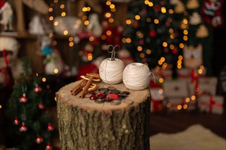 A Christmas scene with beautiful bokeh in the background and sewing tools. In studio