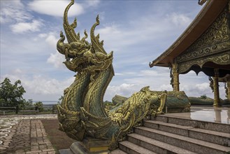 Dragon heads in the temple Wat Sirindhorn Wararam