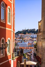 View over the old town of Lisbon to the castle Castelo de Sao Jorge