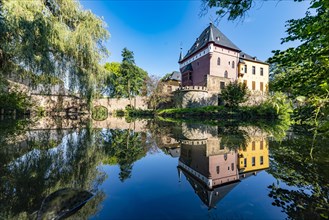 Burgau moated castle reflection