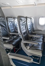 Empty rows of seats in a Lufthansa A320 aircraft