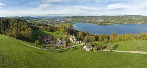 View from the Thurgau lake ridge slope to the farm settlement of Klingenzell with the Marian pilgrimage chapel of Our Lady of Sorrows