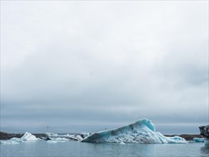 Chunks of ice floating in the glacier lagoon Joekulsarlon