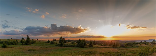 Evening sunset over the mountains in spring. panoramic view