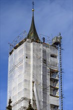 The scaffolded steeple of the church of St. Blasius and Quirinus in Dietmannsried