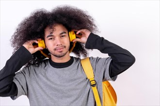 Young man with afro hair on white background