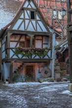 Christmas decorated small half-timbered house