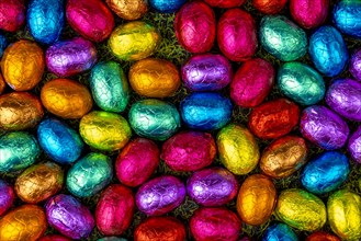 Colourful Easter candy on grass