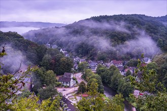 View of the village of Burg with the river Wupper in morning fog
