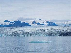 Glacier calving into Joekulsarlon Glacier Lagoon