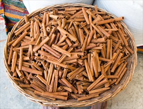 Stack of of Cinnamon sticks in view as background