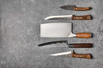 Different kinds of butchers knives forged by blacksmith