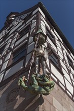 Sculpture of St. George as dragon slayer on the historic Pilatus House