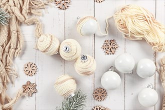 Boho style DIY Christmas bauble ornaments with cream colored wool cord