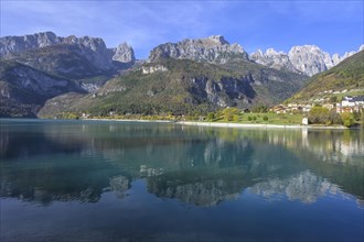 Mountains of the Brenta Group reflected in Lake Molveno