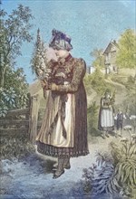 Woman in the traditional traditional costume of Dachau