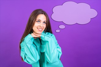 Thinking woman with many ideas with empty bubble on purple background