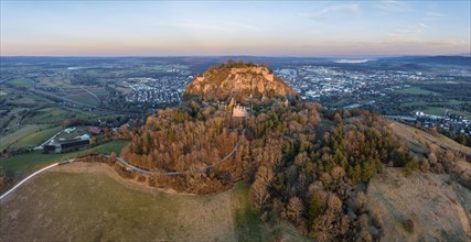 Panorama of the volcanic cone Hohentwiel with the castle ruins illuminated by the evening sun
