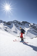 Ski tourers ascending to Kreuzjoch from Schartlestal
