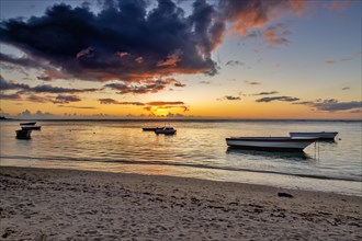 Sunset on the beach of Albion. Albion beach is amongst the most picturesque beaches in Mauritius. Located on the west coast of it is also home to the iconic Lighthouse of Albion