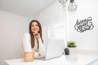 Portrait of businesswoman working with a computer