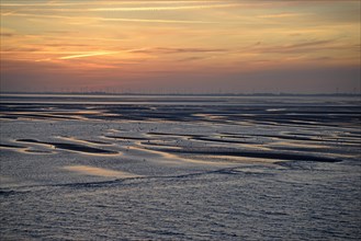 View over the Wadden Sea at low tide to the mainland