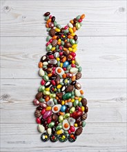 Shape Easter Bunny from Sweets and Candys on Wood