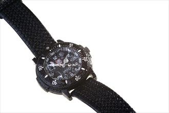 A waterproof wristwatch with water droplets