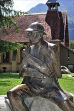 Statue of Sir Arthur Conan Doyles character Sherlock Holmes outside the English Church at Meiringen