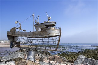 Metal sculpture of fishing boat along the waterfront at Stonehaven