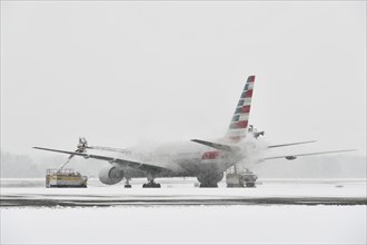 Aircraft deicing in winter in front of take-off