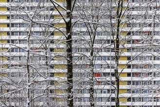 Asemwald residential complex in winter. In front of the facade