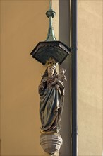 Sculpture of Mary under a canopy