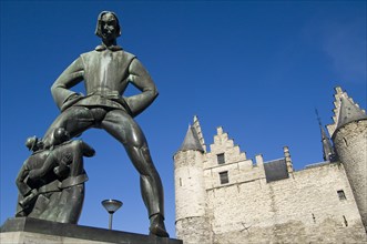 The Lange Wapper statue at the entrance of the castle The Steen on the border of the river Scheldt