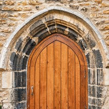 Old door with round arch
