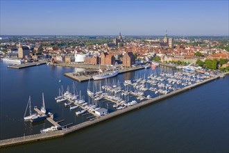 Aerial view over marina in the harbour of the Western Pomeranian city Stralsund along the Strelasund in summer