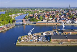 Aerial view over the river Trave and sailing ship Lisa von Luebeck in the old town of the Hanseatic City of Luebeck