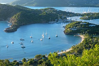 Aerial view over sailing boats and yachts anchored in the English Harbour and Falmouth Harbour bays on the south coast of Antigua island