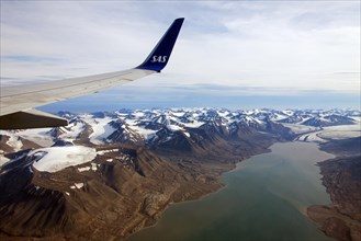 Aerial view from airplane of mountainous landscape of Spitsbergen