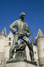 The Lange Wapper statue at the entrance of the castle The Steen on the border of the river Scheldt