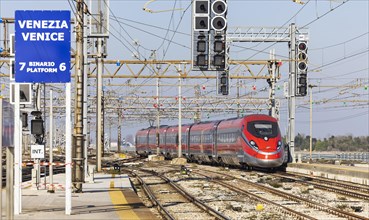 Trenitalias Frecciarossa 1000 high-speed train entering Santa Lucial station