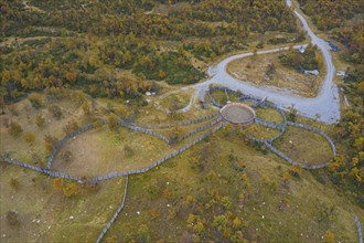 Aerial view over fences of Sami herders corral for trapping reindeer in autumn at Haerjedalen