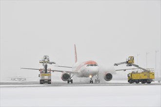 Aircraft de-icing in winter in front of take-off