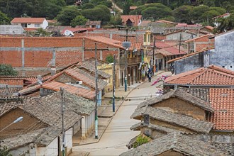 Aerial view over street with houses in the town Samaipata