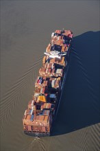 Container ships on the container ships in the fairway of the Elbe