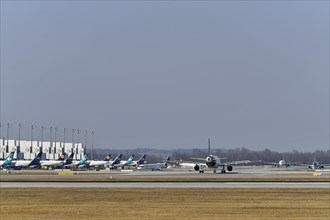 Overview Apron East with Lufthansa and Air Dolomiti aircraft at the satellite and Terminal 2